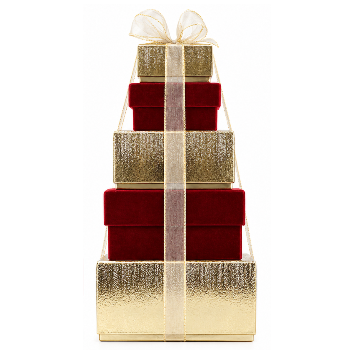 A stack of four gift boxes arranged in a pyramid shape, with metallic gold textured boxes on the outside and deep red velvet boxes on the inside, tied together with a sheer gold ribbon and bow, on a white background.
