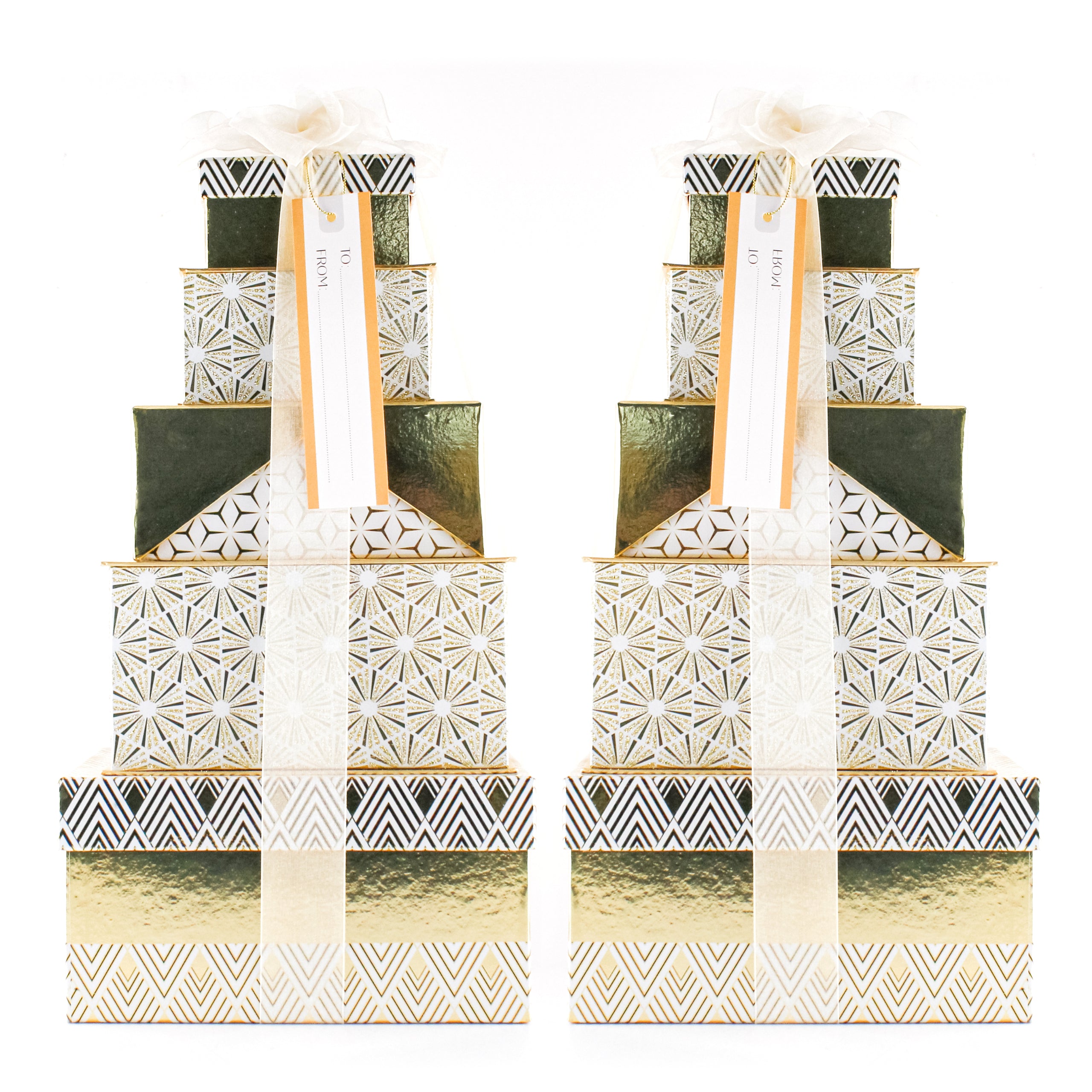 Two Gold and white detailed box gifts stacked into a tower