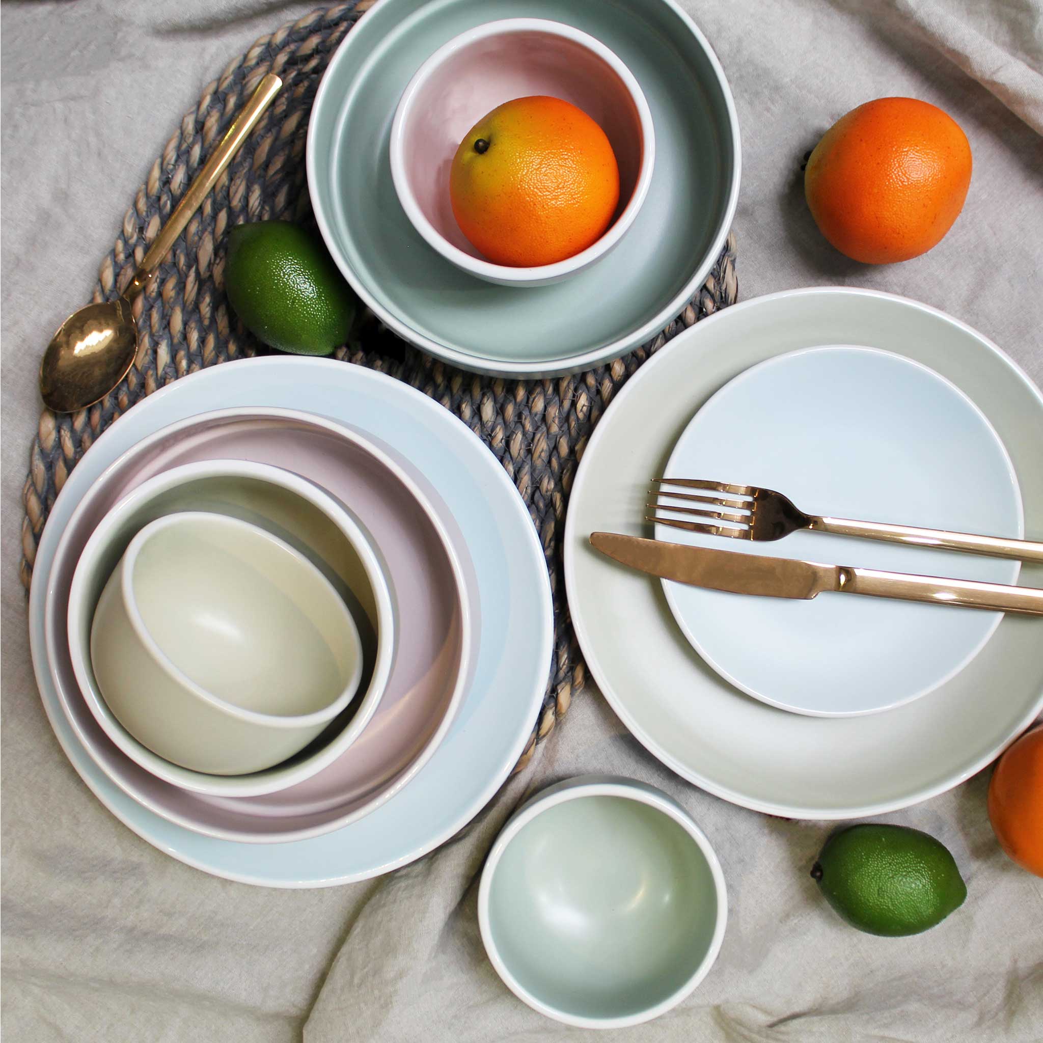 Stone dinner sets with oranges