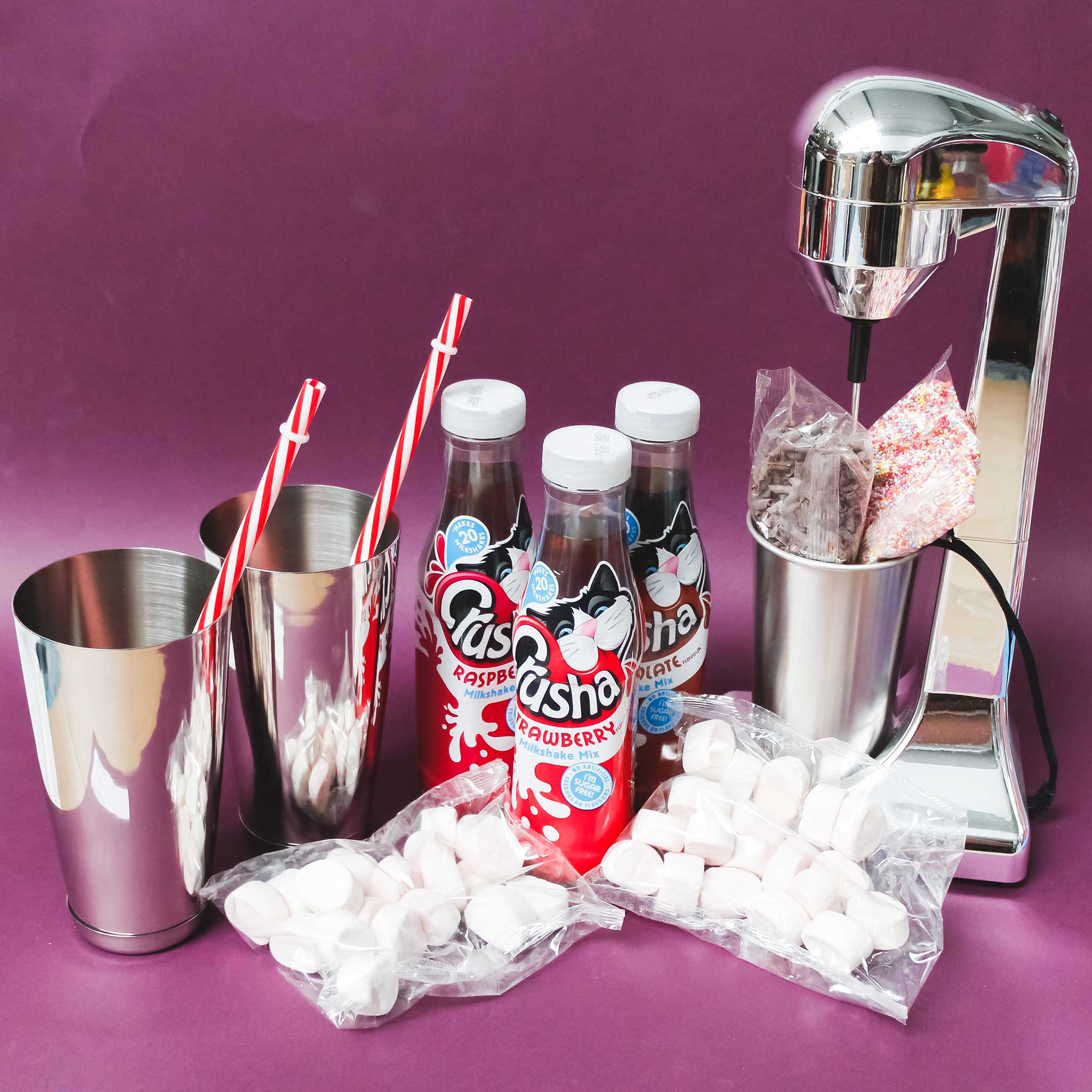 Milkshake making set with metal tumblers and straws